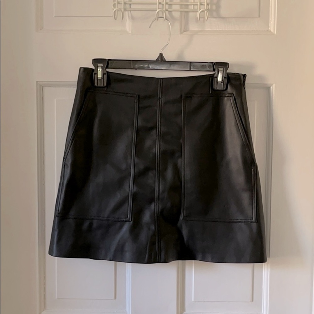 Faux leather mini skirt with deep pockets
